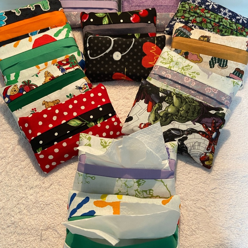 5-pack Tissue holders, washable and reusable comes with a free pack of tissues.